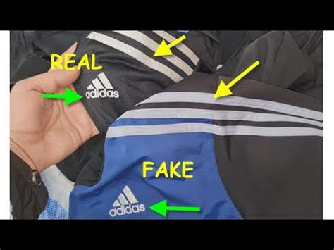 how to spot fake adidas tracksuit|real adidas tracksuit jacket.